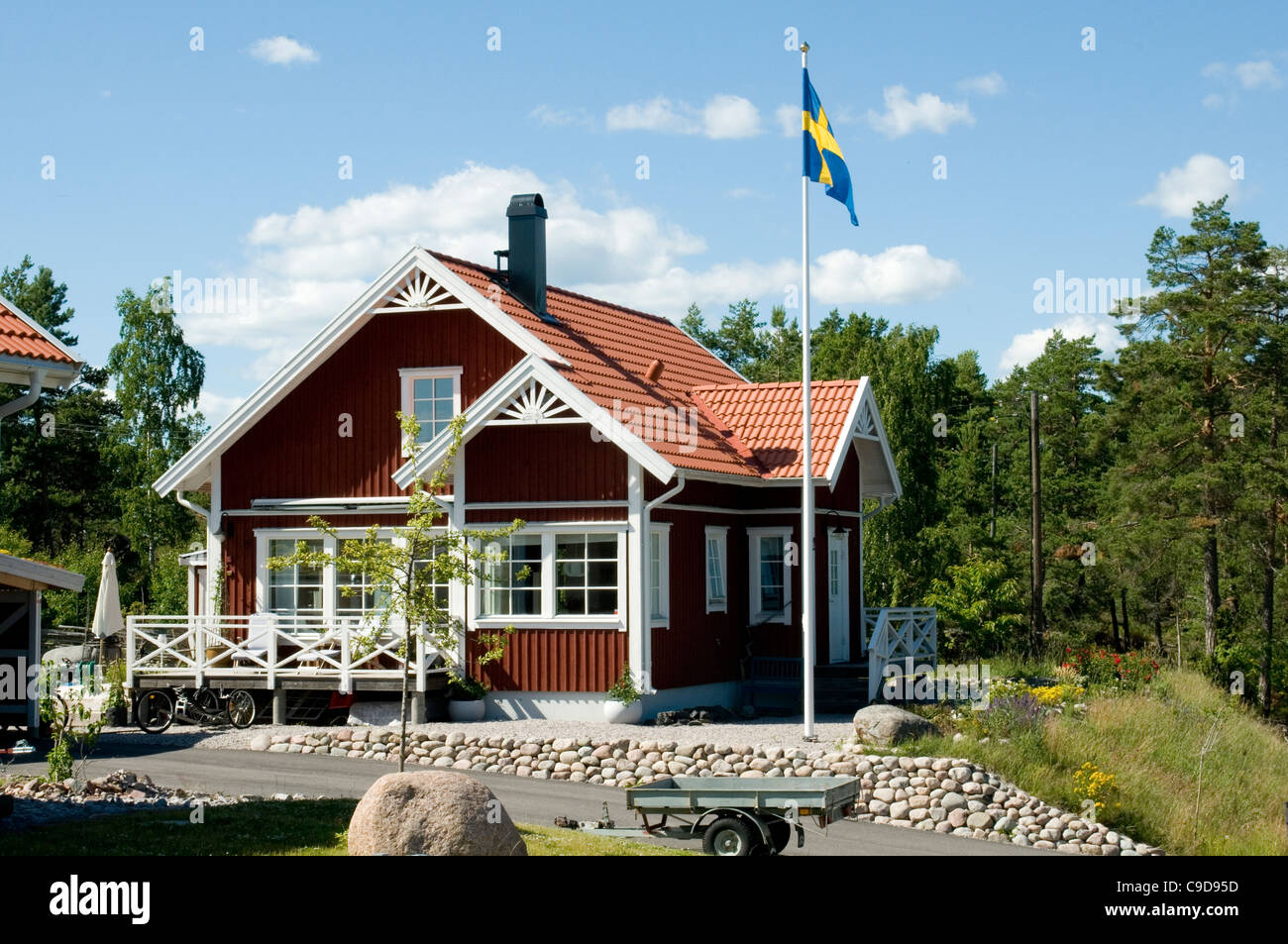 Rosso svedese casa case home case rosso Falu Rödfärg Falun asta proprietà di estate Foto Stock