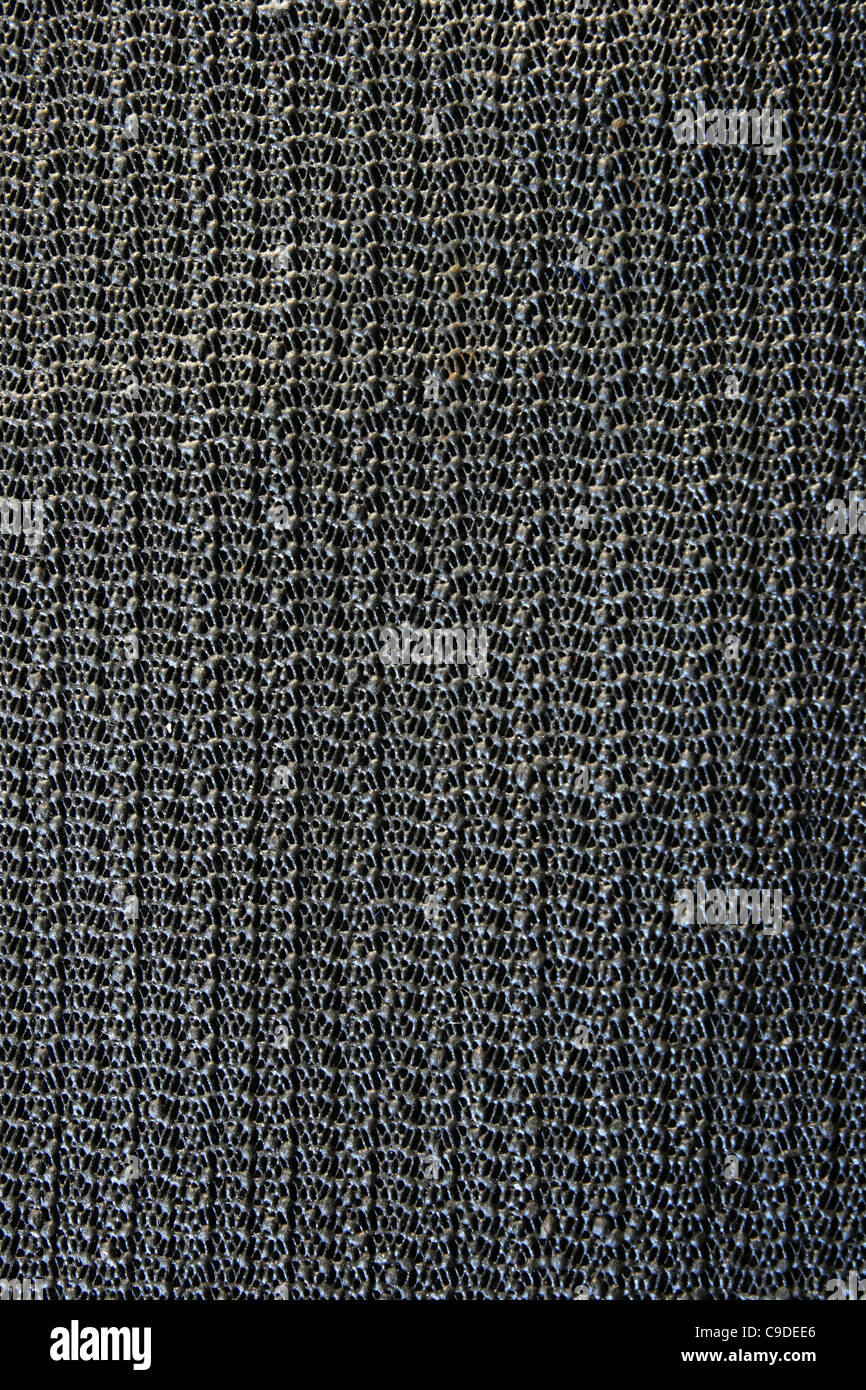 Nero in gomma antiscivolo rete appiccicosa pad texture di sfondo Foto Stock