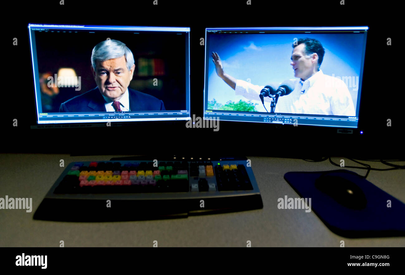 Dic. 27, 2011 - Des Moines, Iowa, USA - screen grabs di annunci politici dal repubblicano candidati presidenziali Newt Gingrich e Mitt Romney sono acquisiti dal monitor in un editing bay a KCCI TV, la CBS affiliate di Des Moines. Più di dieci milioni di dollari nello Iowa inserzioni sono stati spesi in modo Foto Stock
