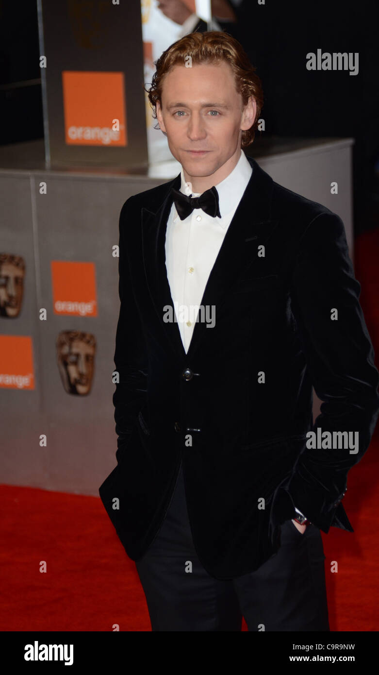 London, Regno Unito 12/02/2012 Tom Hiddleston assiste la Orange British Academy Film Awards 2012 presso la Royal Opera House Covent Garden di Londra. (Photo credit: Photobeat Immagini/Alamy) Foto Stock