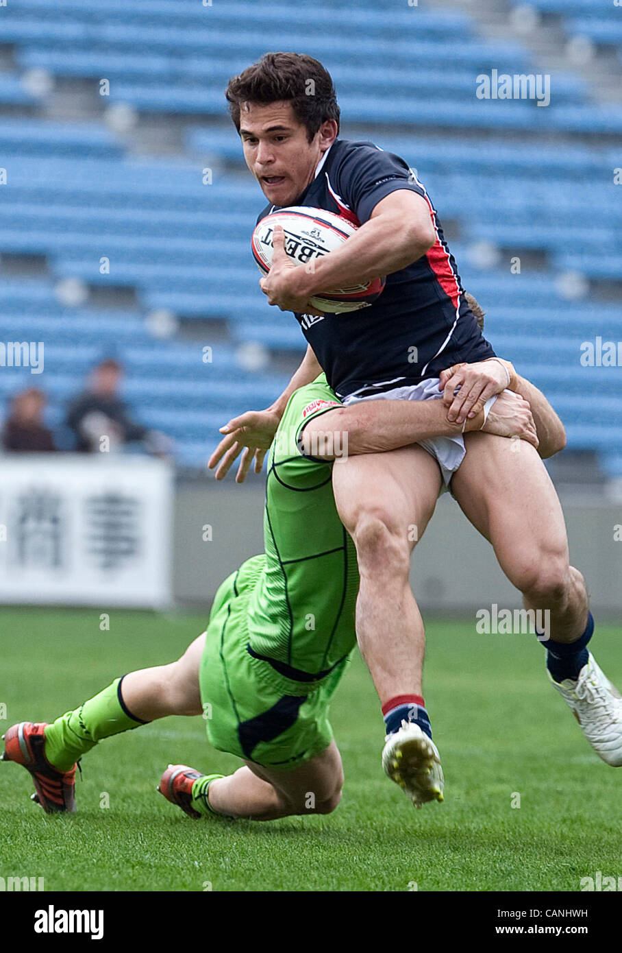 Azione dall'Australia vs Hong Kong corrispondano durante un round 7 Match di rugby 7s world series a Tokyo in Giappone il 31 marzo, 2012. Samoa ha vinto 14-7. Fotografo: Robert Gilhooly Foto Stock