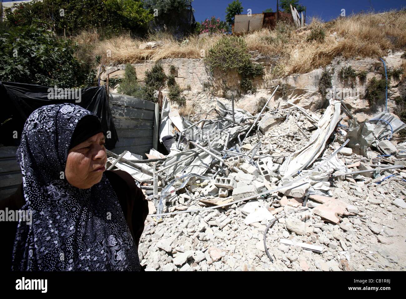 21 maggio 2012 - Gerusalemme, Gerusalemme, Territorio palestinese - Sondaggio palestinesi il danno la loro casa in Gerusalemme la città vecchia il 20 maggio 2012. Migliaia di Israeliani hanno marciato in Gerusalemme la città vecchia a celebrare la Giornata di Gerusalemme quando lo stato ebraico ha catturato l'Arabo settore orientale 45 anni ag Foto Stock