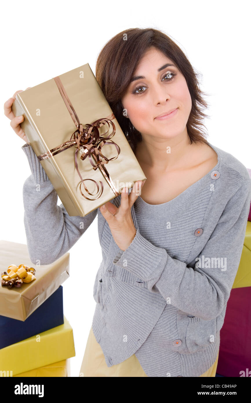Shopping giovane donna con un sacco di regali, su bianco Foto Stock