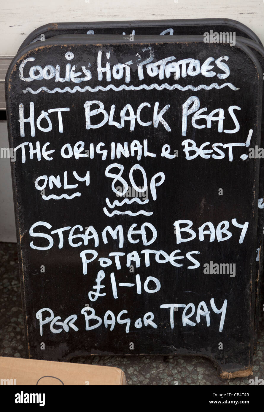 Nero caldo piselli stallo a seppellire Market Foto Stock