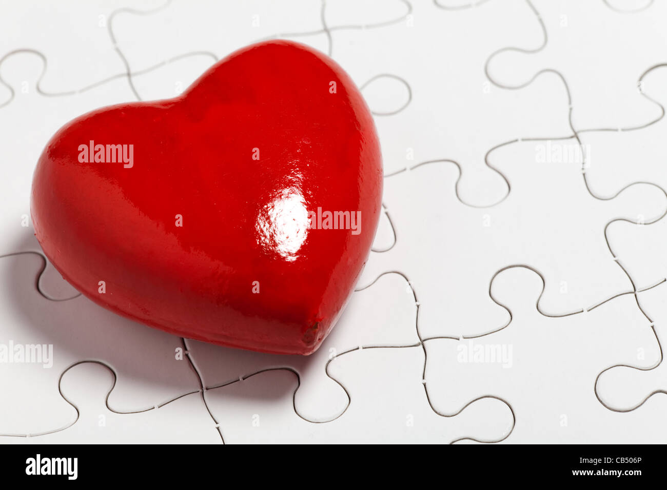 Cuore rosso e Puzzle, concetto di amore Foto Stock