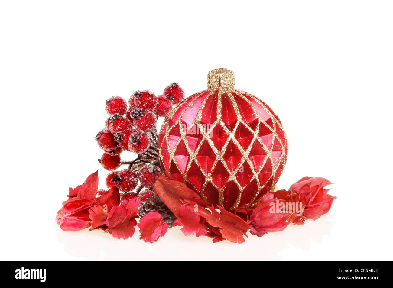 Decorazione di Natale, un rosso e oro glitter ninnolo con potpourri e bacche smerigliato Foto Stock
