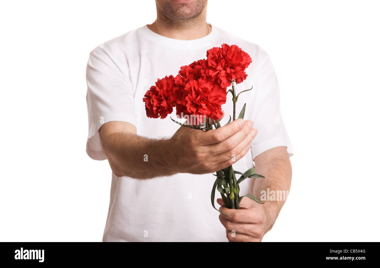 Uomo con fiori isolati su bianco bakground Foto Stock