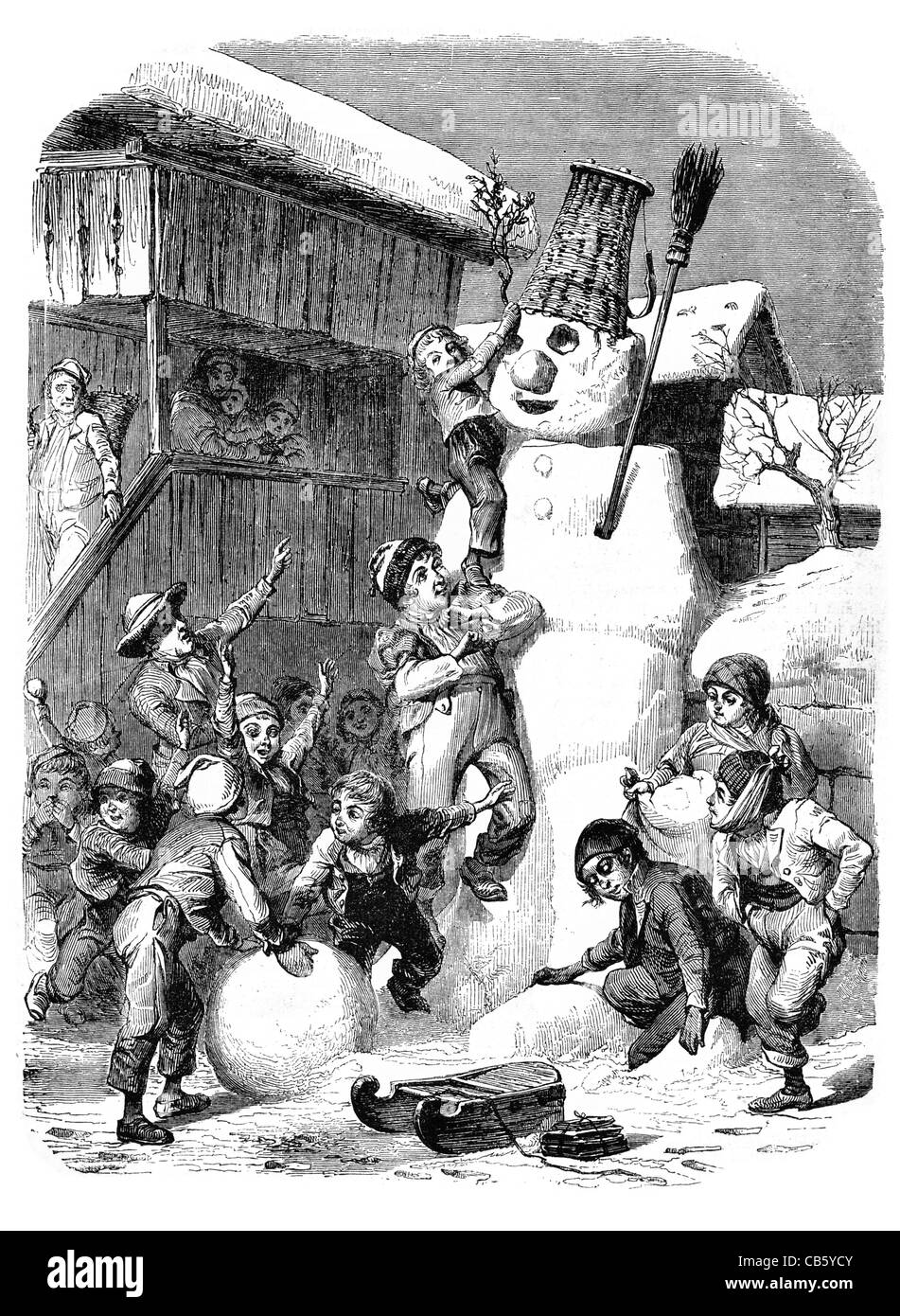 Uomo di neve da Karl Girardet pupazzo di neve di Natale xmas ghiacci invernali figli giocare divertimento Palle Palla village cottage casa famiglia papà Foto Stock