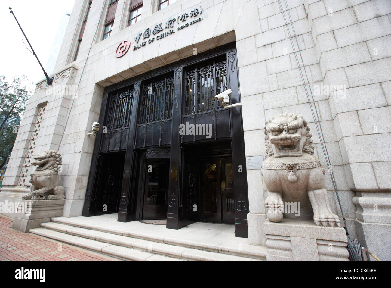 Ingresso della ex Banca di Cina sede cinese con custode Lions del distretto centrale, isola di Hong kong, RAS di Hong Kong, Cina Foto Stock