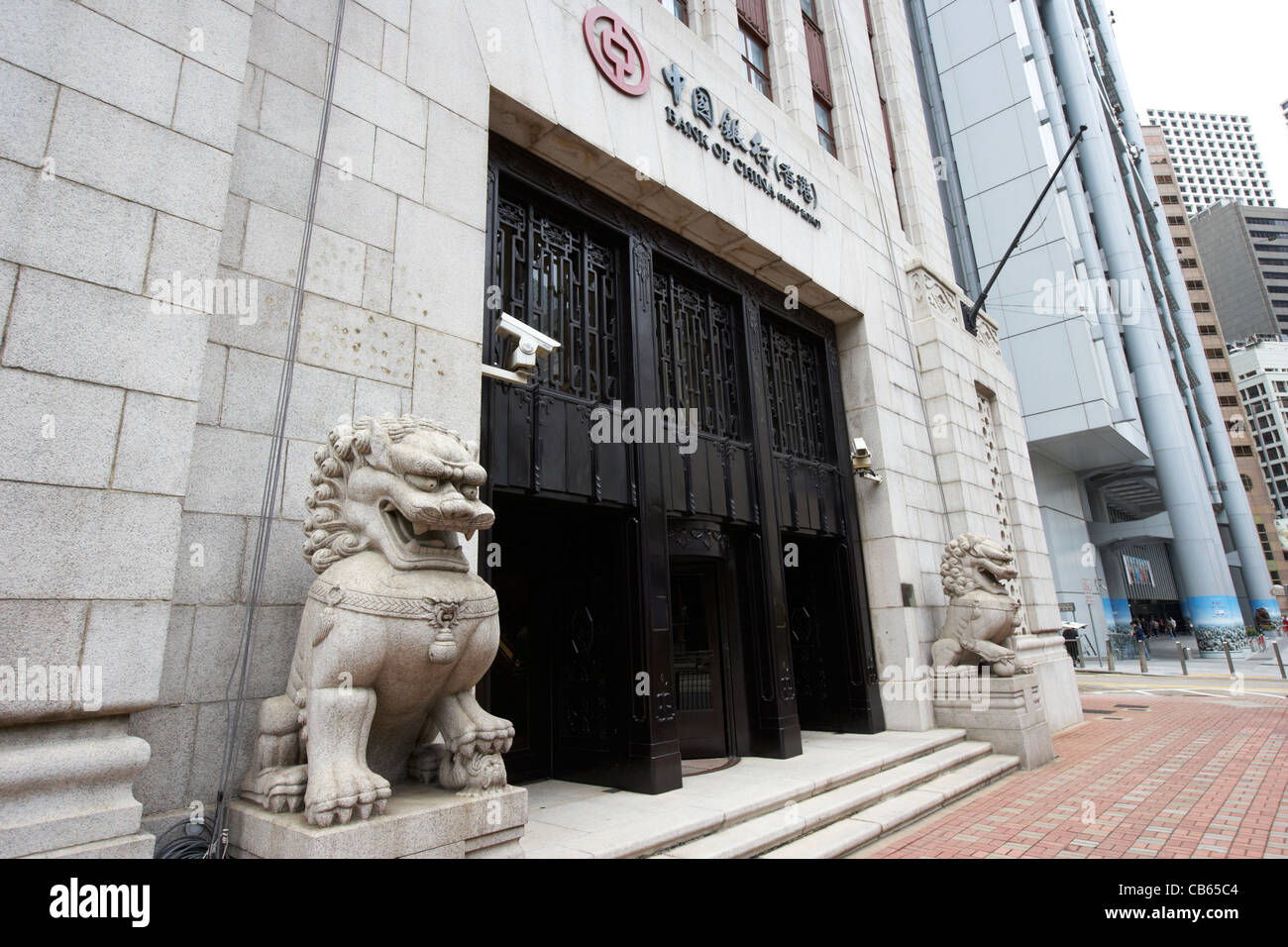 Ingresso della ex Banca di Cina sede cinese con custode Lions del distretto centrale, isola di Hong kong, RAS di Hong Kong, Cina Foto Stock