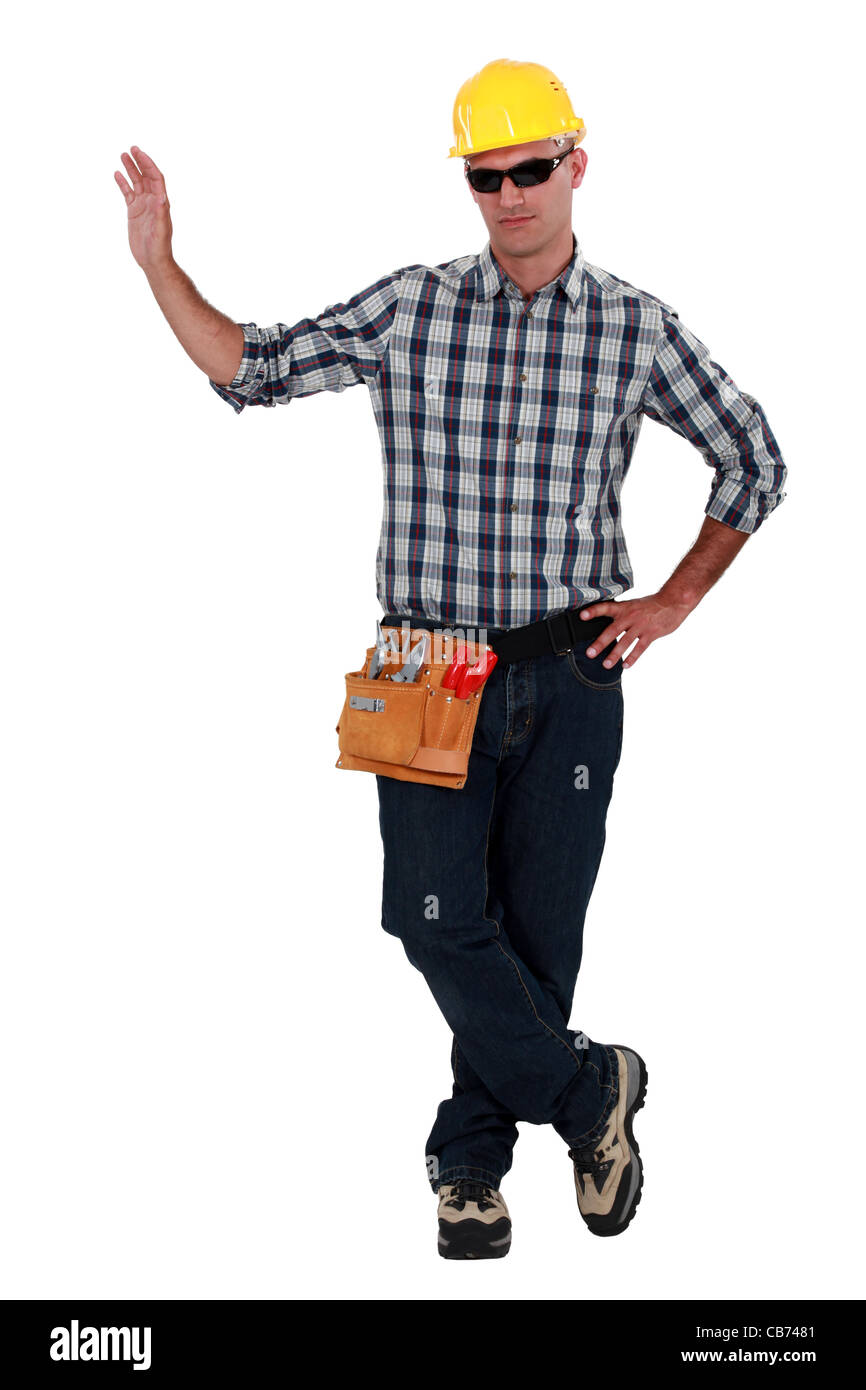 Tradesman indossando occhiali da sole Foto Stock