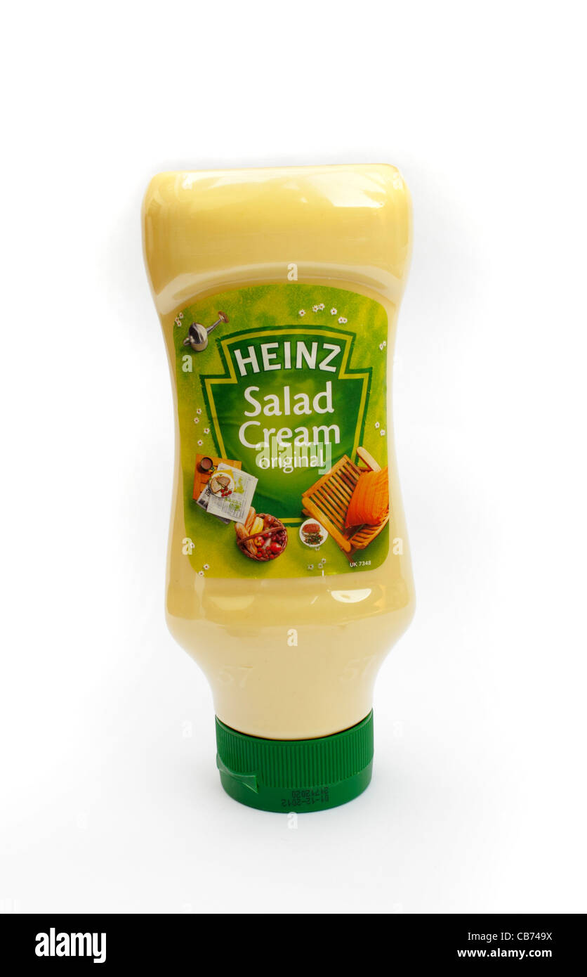 Una bottiglia schiacciabile di Heinz crema insalata maionese originale medicazione intaglio su sfondo bianco Foto Stock