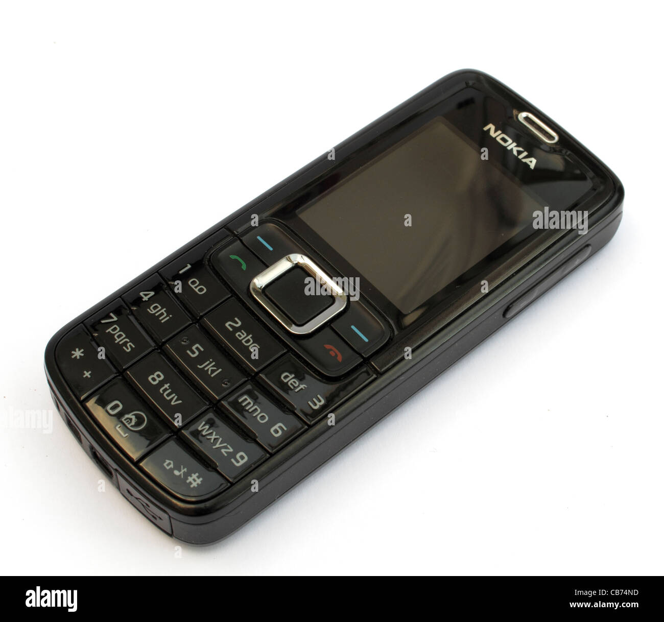 Un semplice telefono cellulare Nokia su sfondo bianco Foto Stock