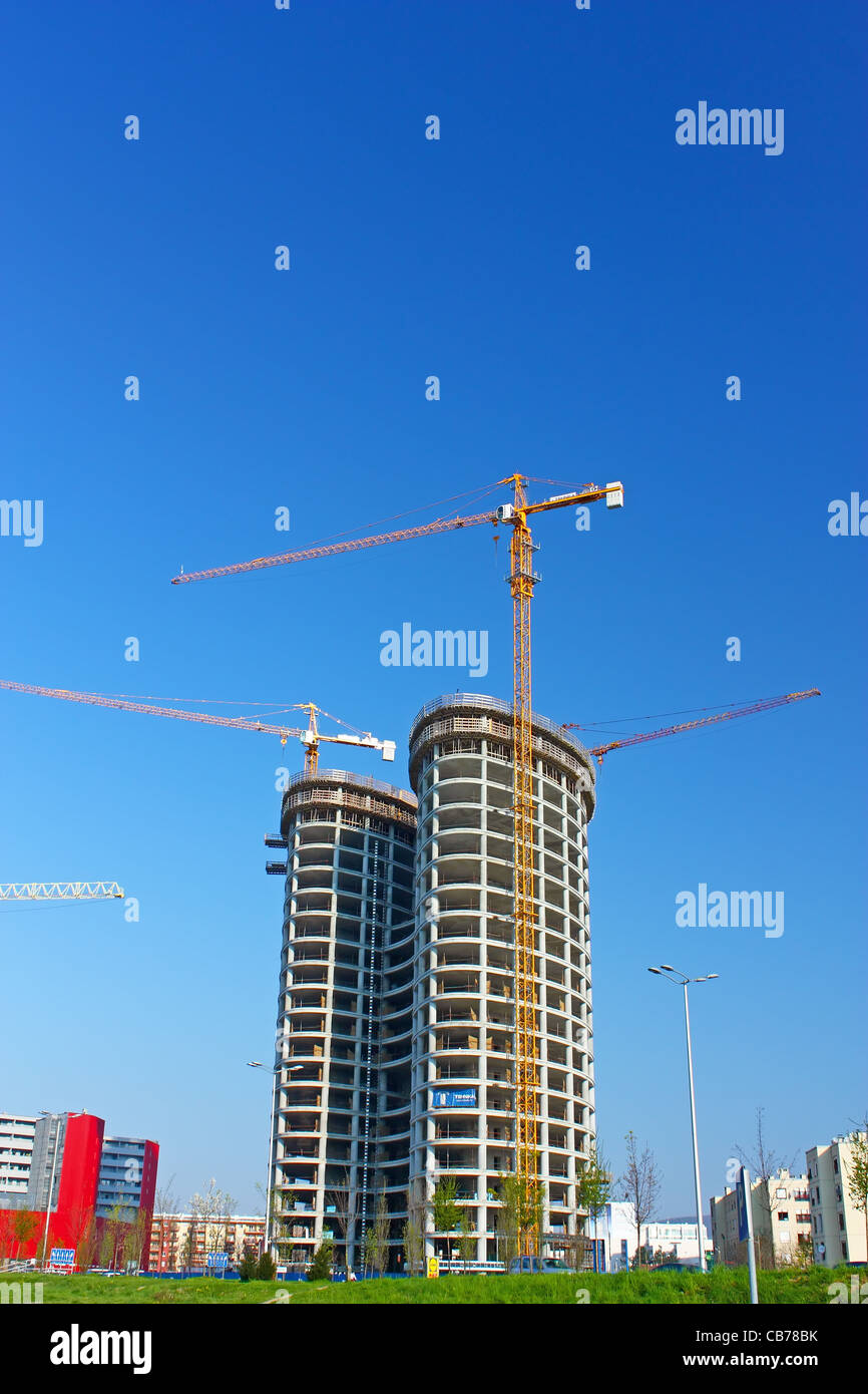 Costruzione edificio gru nuova torre di business Foto Stock