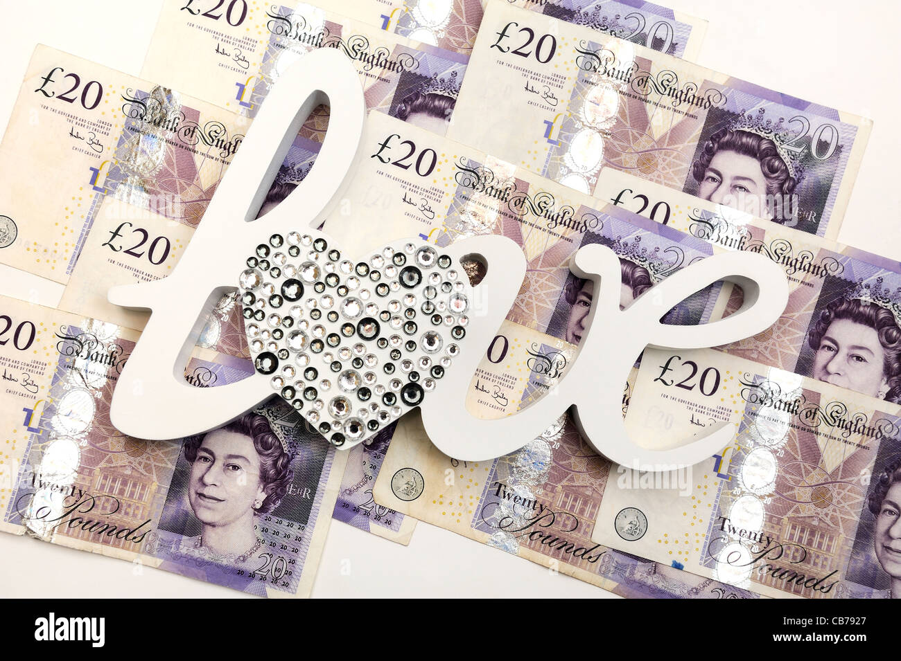 Amore di denaro contante in inglese valuta venti pound note Foto Stock