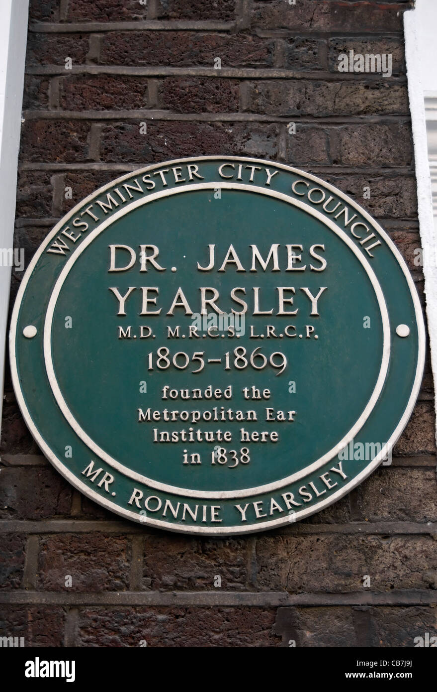 Marcatura della placca il sito dove, nel 1838, medico james yearsley fondato il metropolitan ear Institute di Londra, Inghilterra Foto Stock