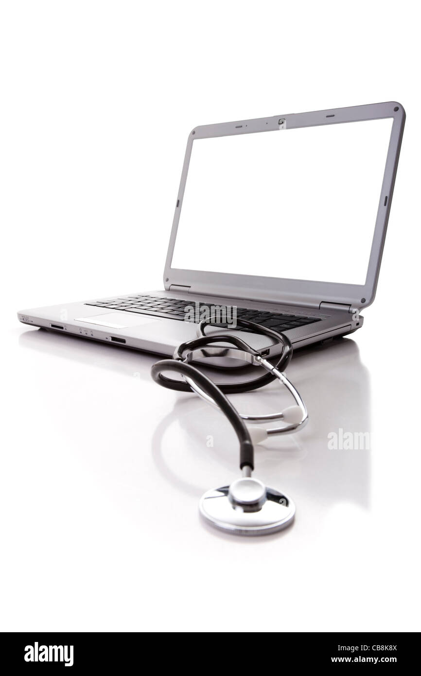 Computer portatile con uno stetoscopio per la buona manutenzione (messa a fuoco selettiva) Foto Stock