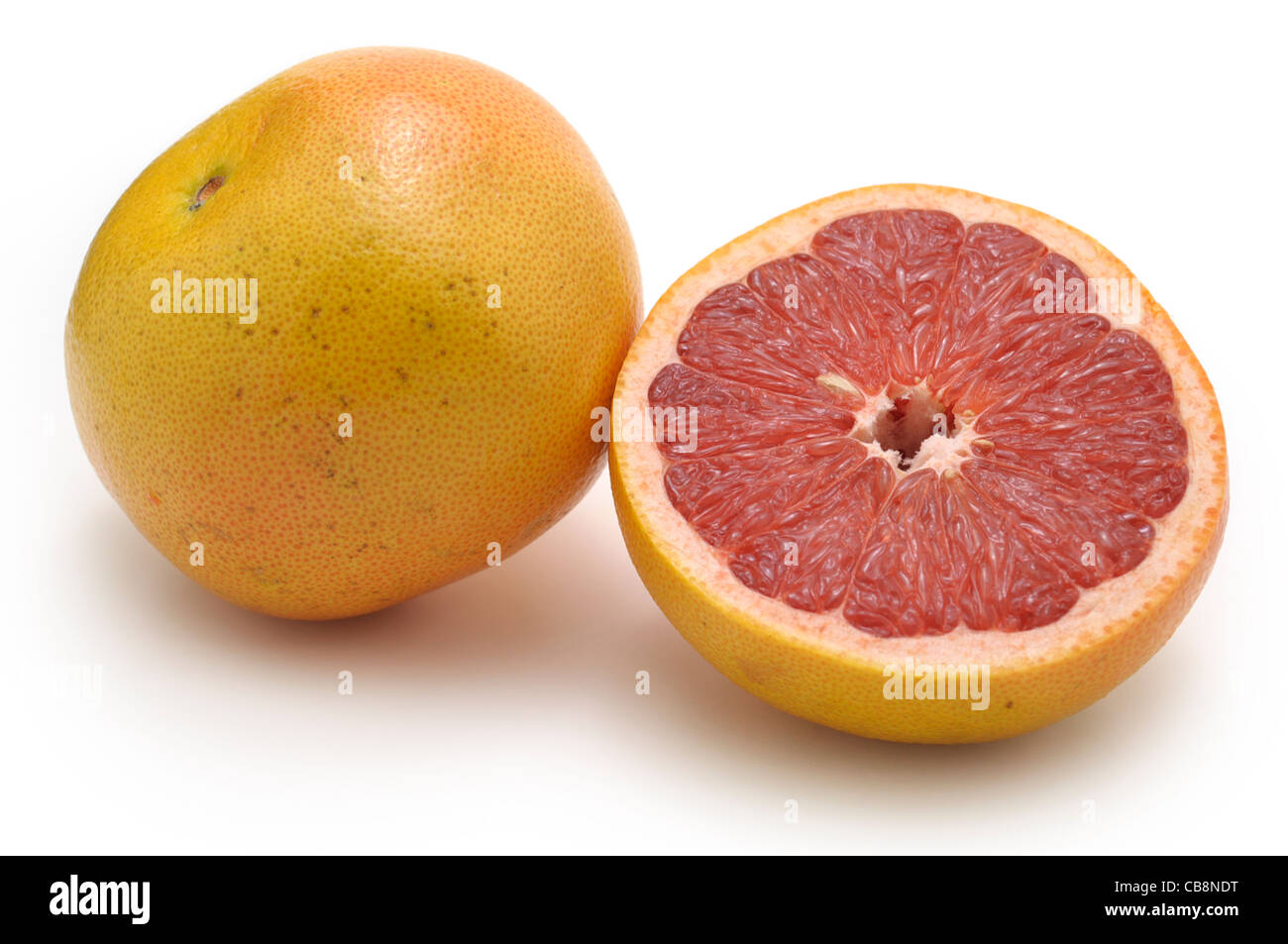Tutta di pompelmo e mezza, rosa Foto Stock