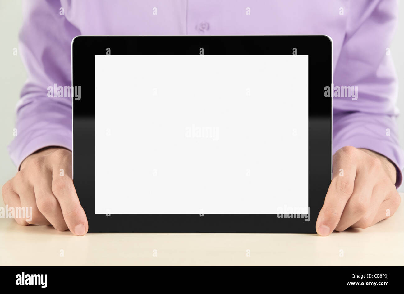 Imprenditore che mostra digitale bianco tablet pc. Foto Stock