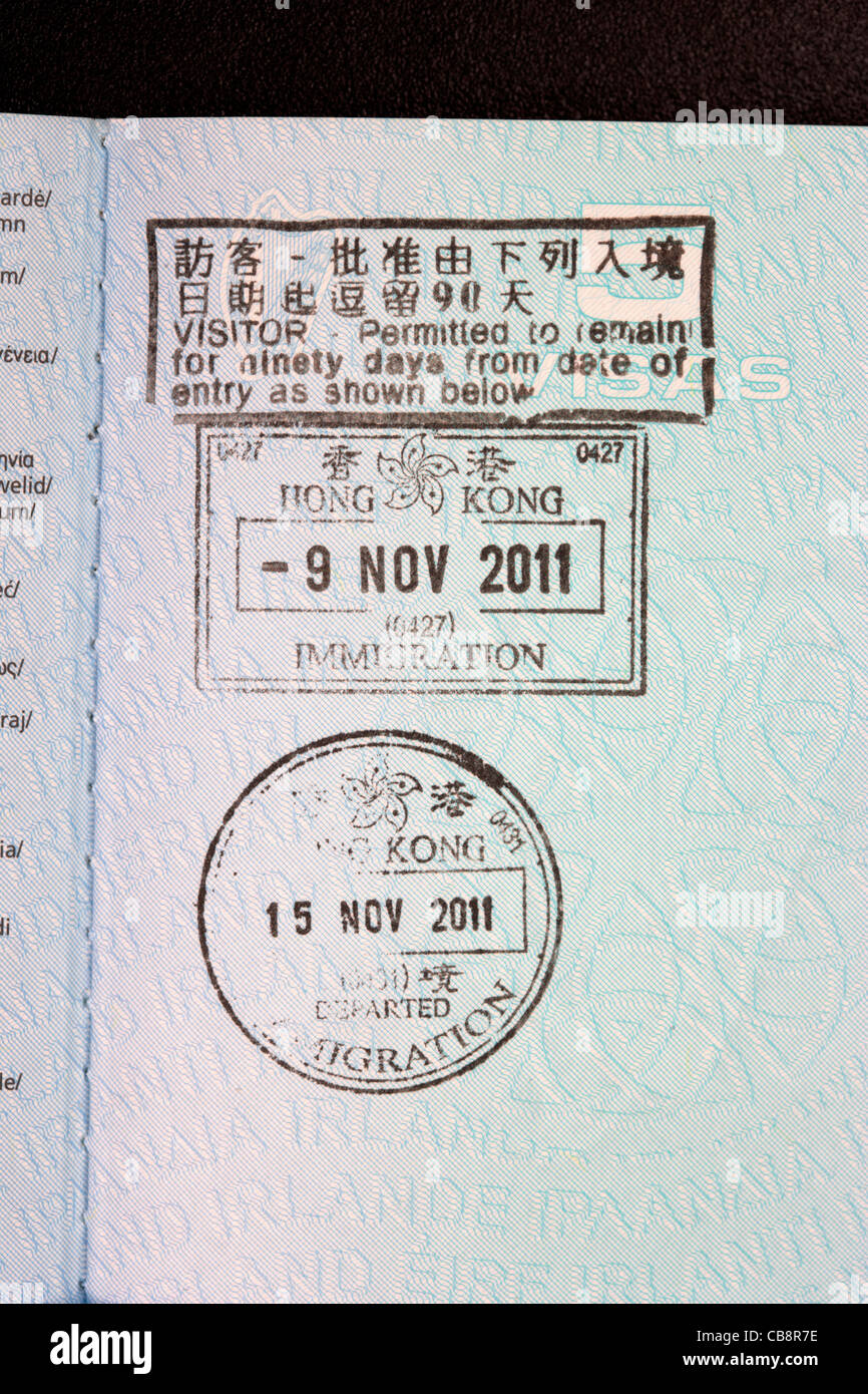Voce hong kong e il visto di uscita apposto il timbro in una UE passaporto irlandese Foto Stock