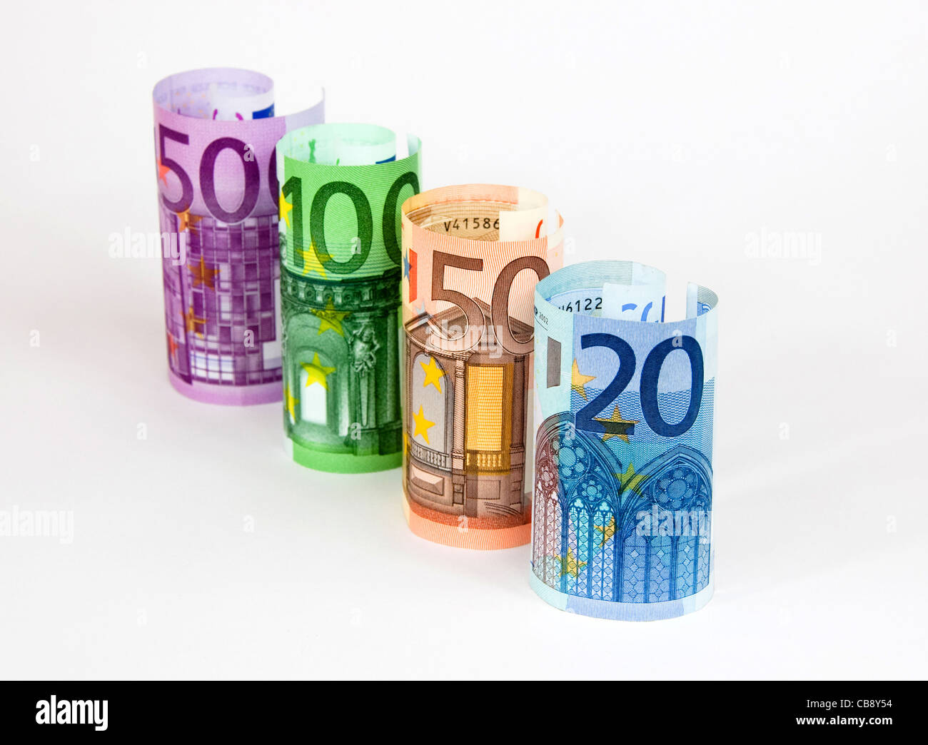 Arrotolate le banconote in euro. Foto Stock