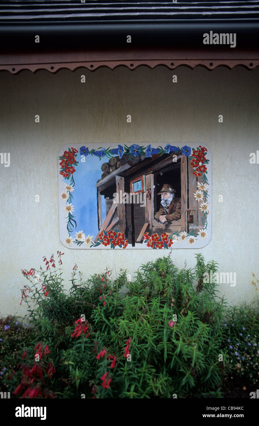 Australia e Tasmania, Grindelwald, scena dipinta su uno dei te svizzera di numerosi edifici di stile. Foto Stock