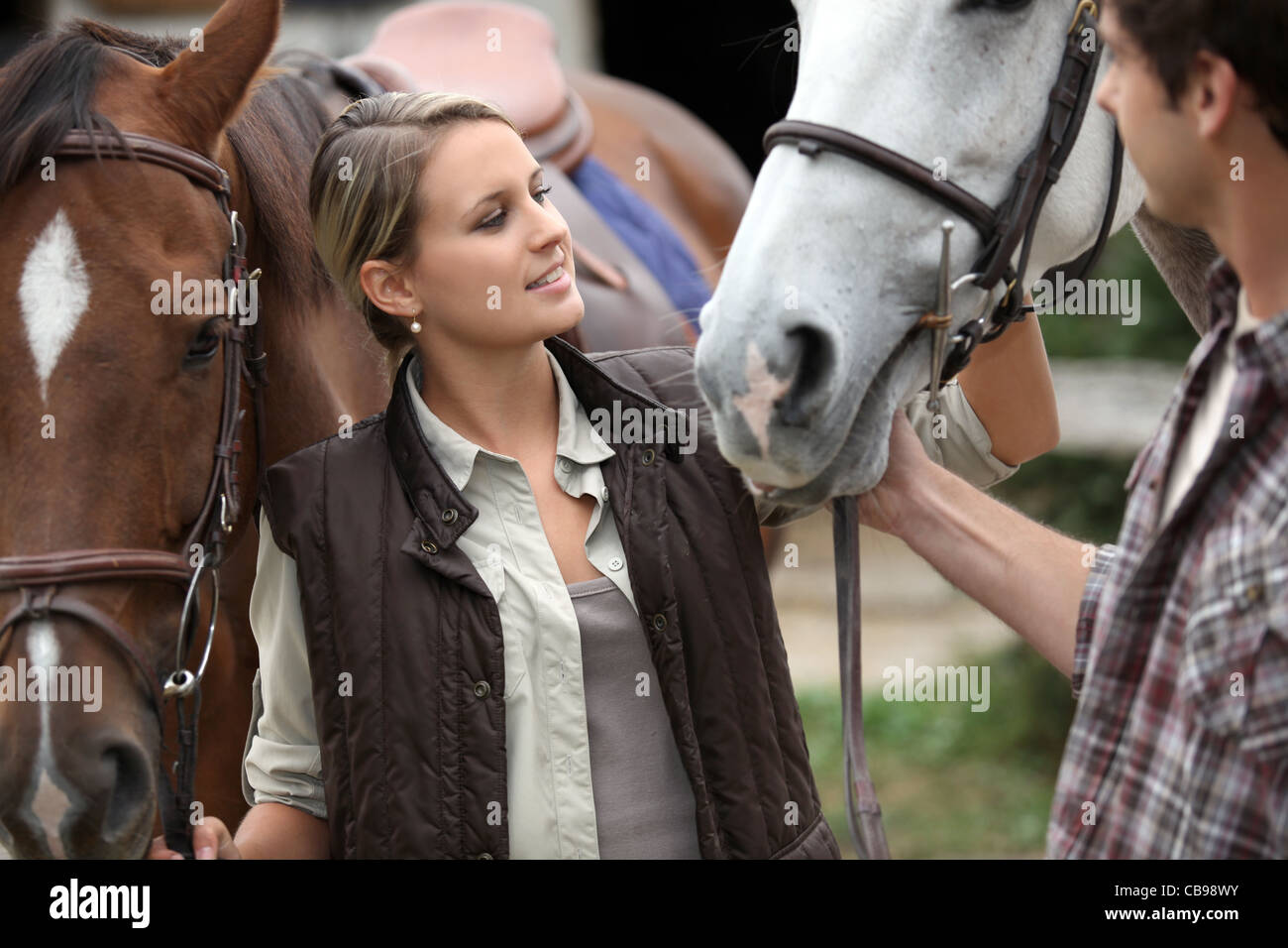 Ritratto di una giovane donna con i cavalli Foto Stock