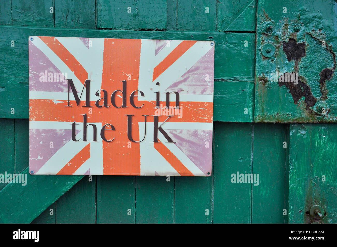Realizzato nel segno del Regno Unito sulla porta di piccole unità industriali officina. Foto Stock