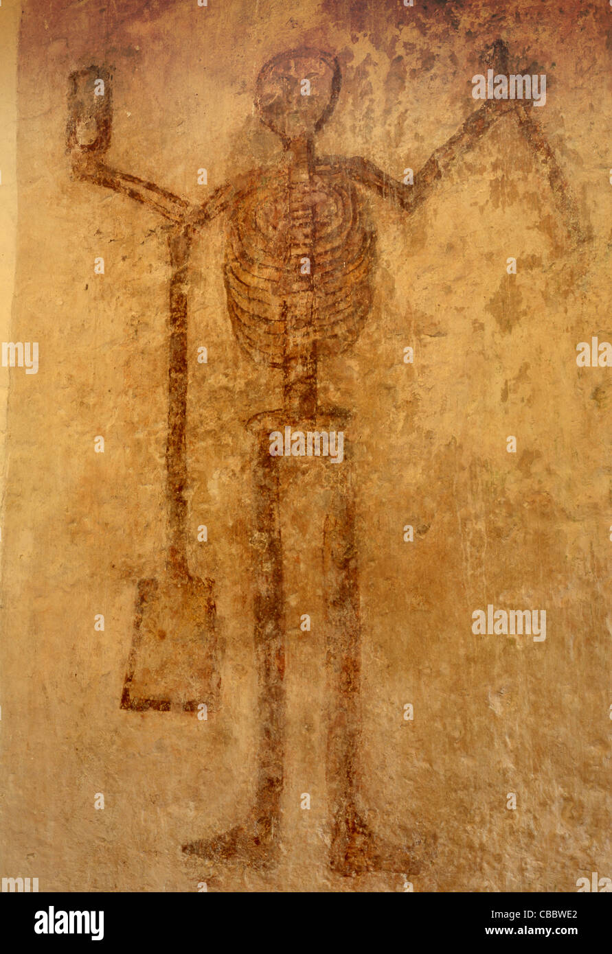 Pittura murale medioevale del muscolo scheletrico figura che rappresenta la morte di san Issui la Chiesa Partrishow Powys South Wales UK Foto Stock