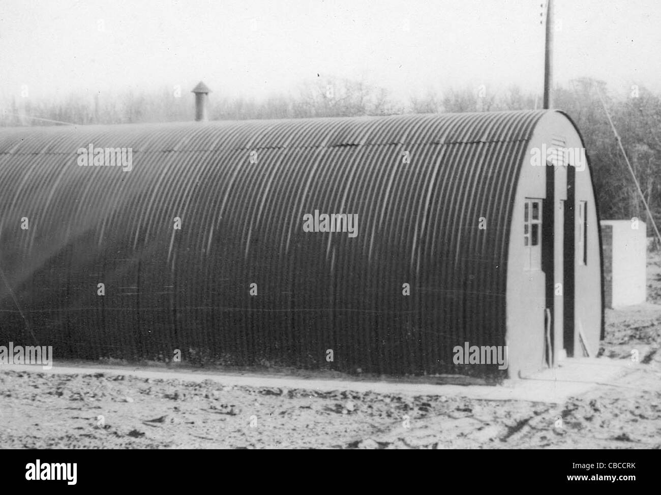 A WW11 USAAF alloggio hut noto come un Quanset o capanna nissena. In Inghilterra. Foto Stock