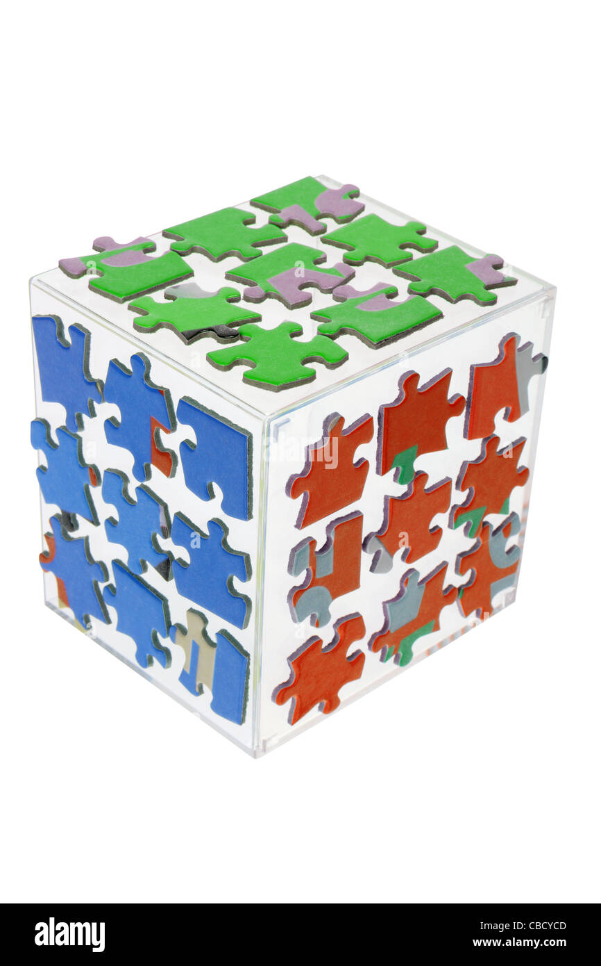 Puzzle di pezzi sul cubo Foto Stock