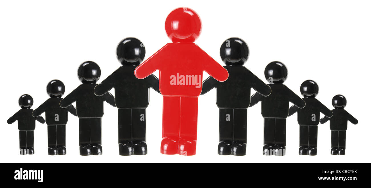 Concetto di lavoro di squadra in plastica con figure in miniatura Foto Stock