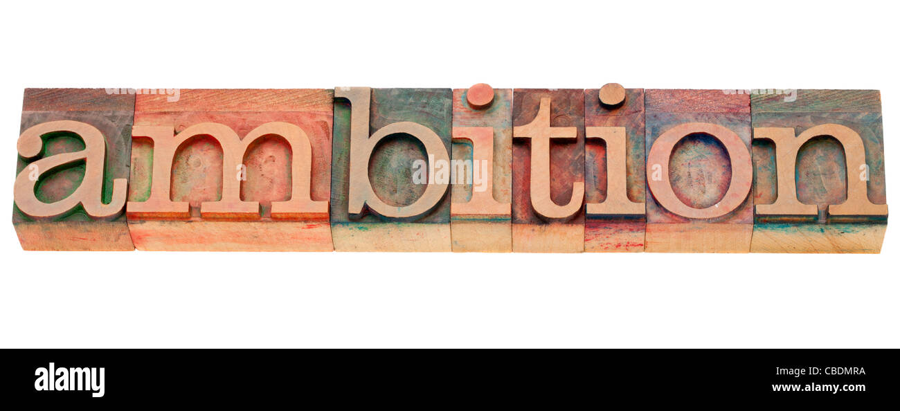 Ambizione - parola isolata in legno vintage tipografia blocchi Foto Stock