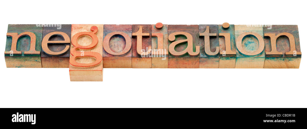 Negoziazione - parola isolata in legno vintage tipografia blocchi Foto Stock