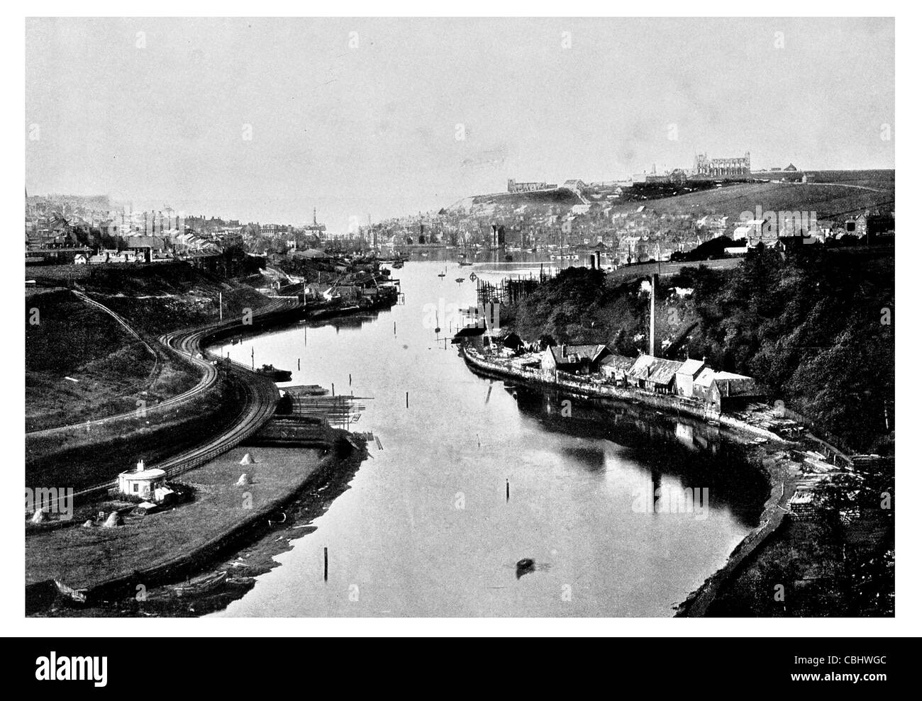 Whitby città balneare Yorkshire Inghilterra fiume Esk patrimonio turistico Abbey Caedmon porto per la pesca di aringhe della caccia alla balena Captain Cook Harbour Foto Stock