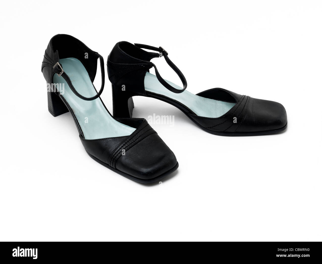 In cuoio nero tacco alto scarpe con cinghie di fissaggio Foto Stock