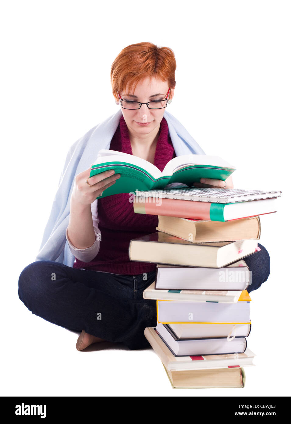 Studente ragazza con molti libri isolati su sfondo bianco Foto Stock