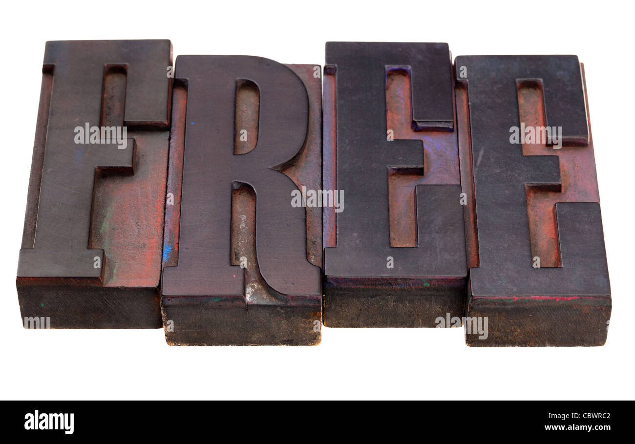 Libera parola in legno di antiquariato tipografia blocchi, macchiata di inchiostri a colori, isolato su bianco Foto Stock
