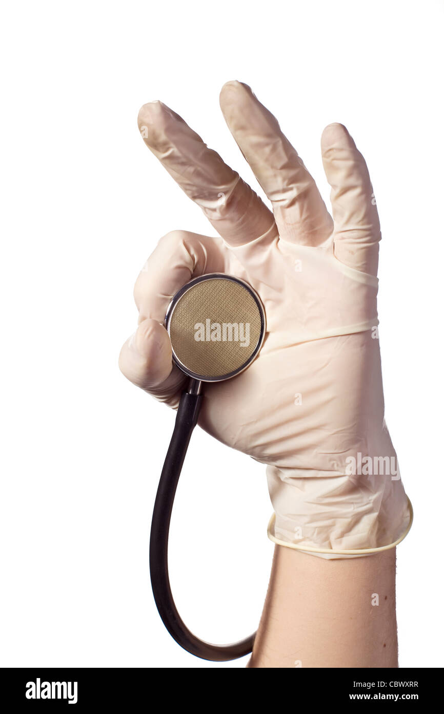 Stetoscopio medico in mano su sfondo bianco Foto Stock