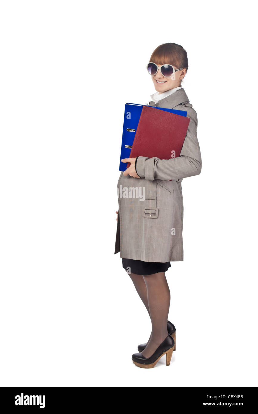 Imprenditrice con libro in abito nero isolato su sfondo bianco Foto Stock