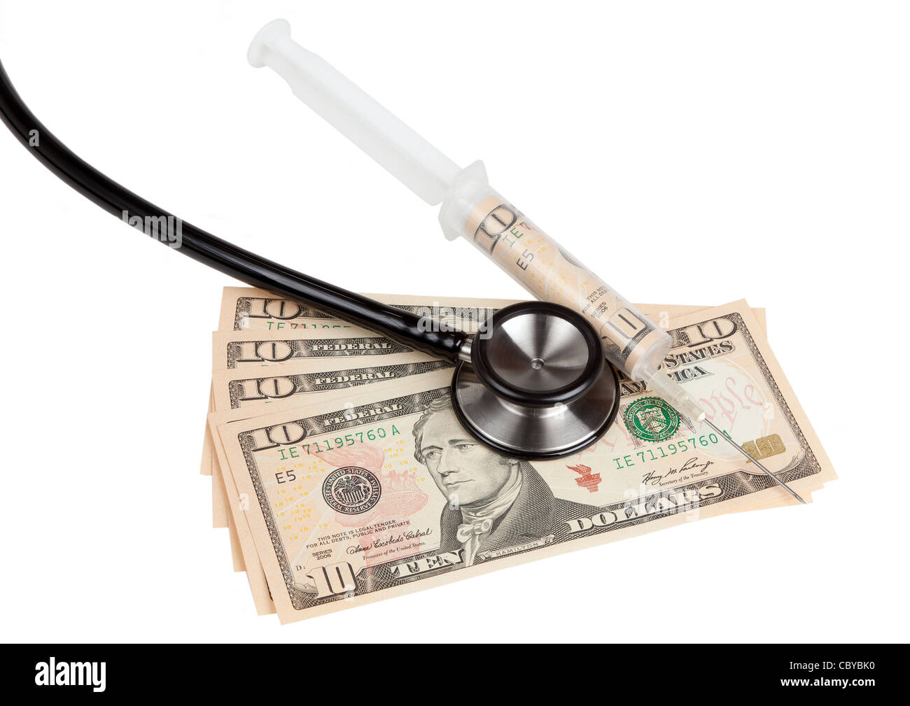 Uno stetoscopio e la siringa su dieci le fatture del dollaro Foto Stock