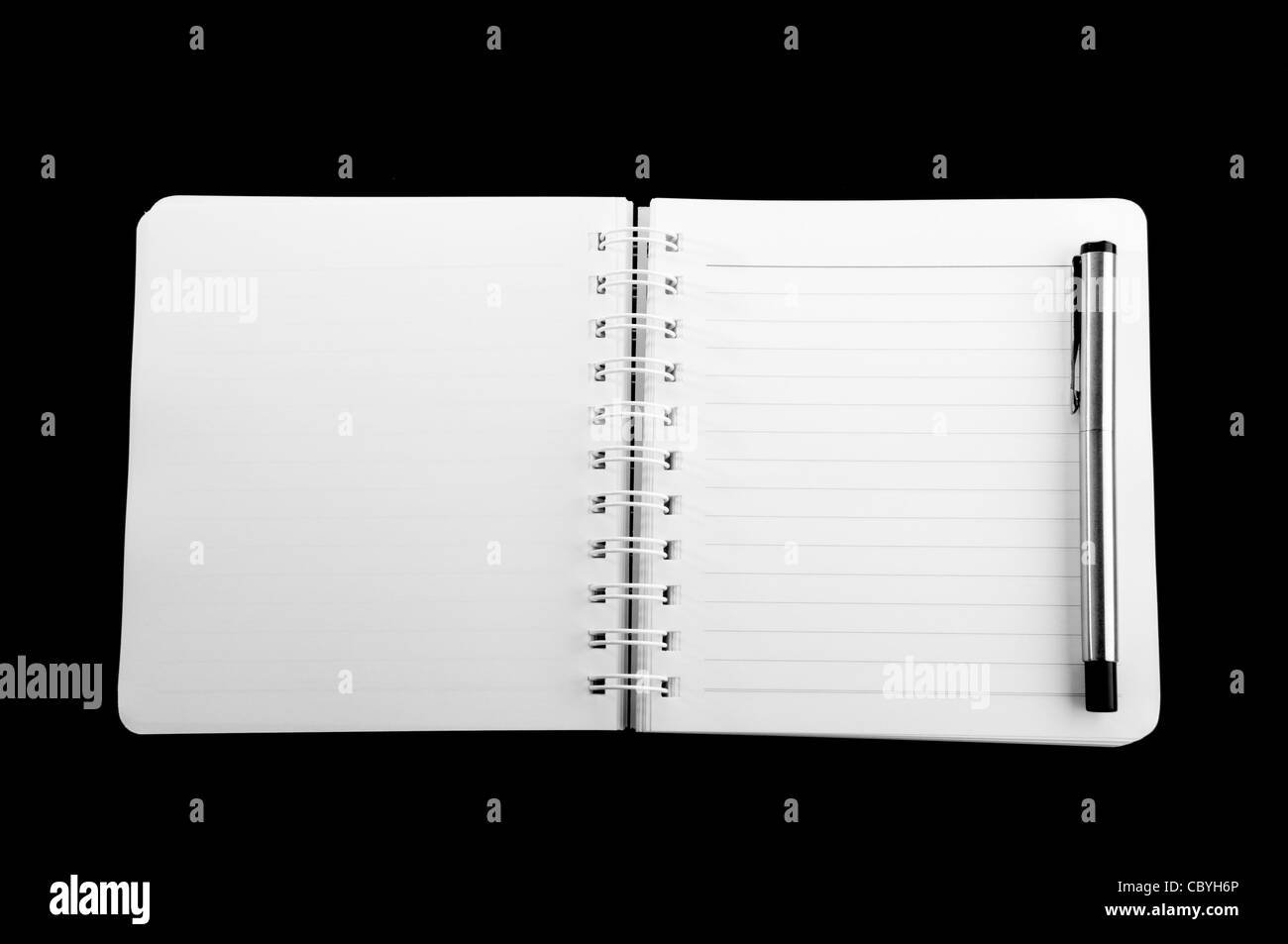 Rilegato a spirale per notebook rivestito con carta e penna Foto Stock