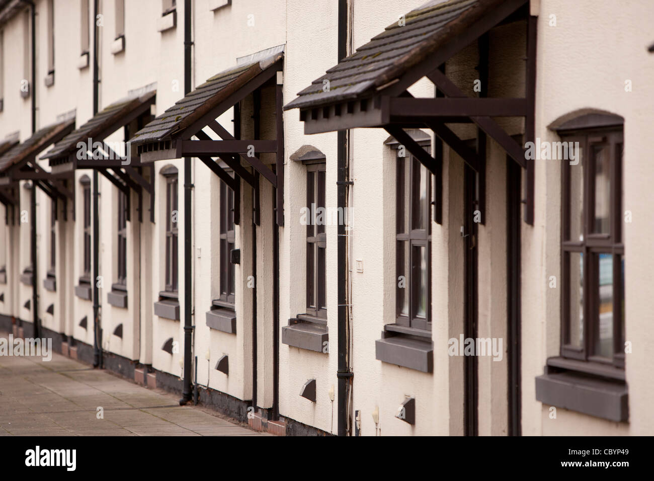 Una fila di lavoratori identici cottages presso il villaggio di Vulcan in Winnick, Warrington Foto Stock