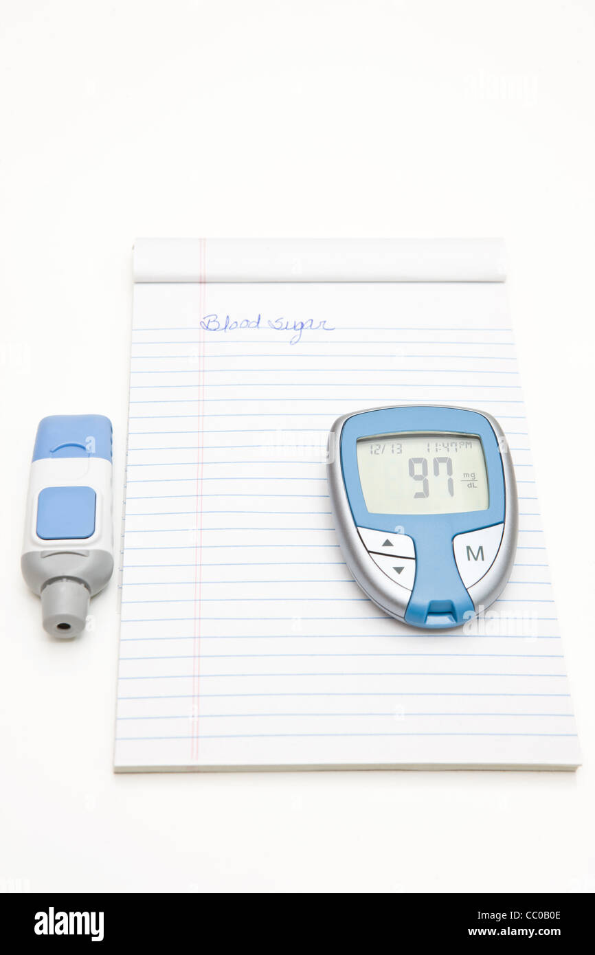 Diabetici Monitor di glucosio, Lancet e Log Book Foto Stock