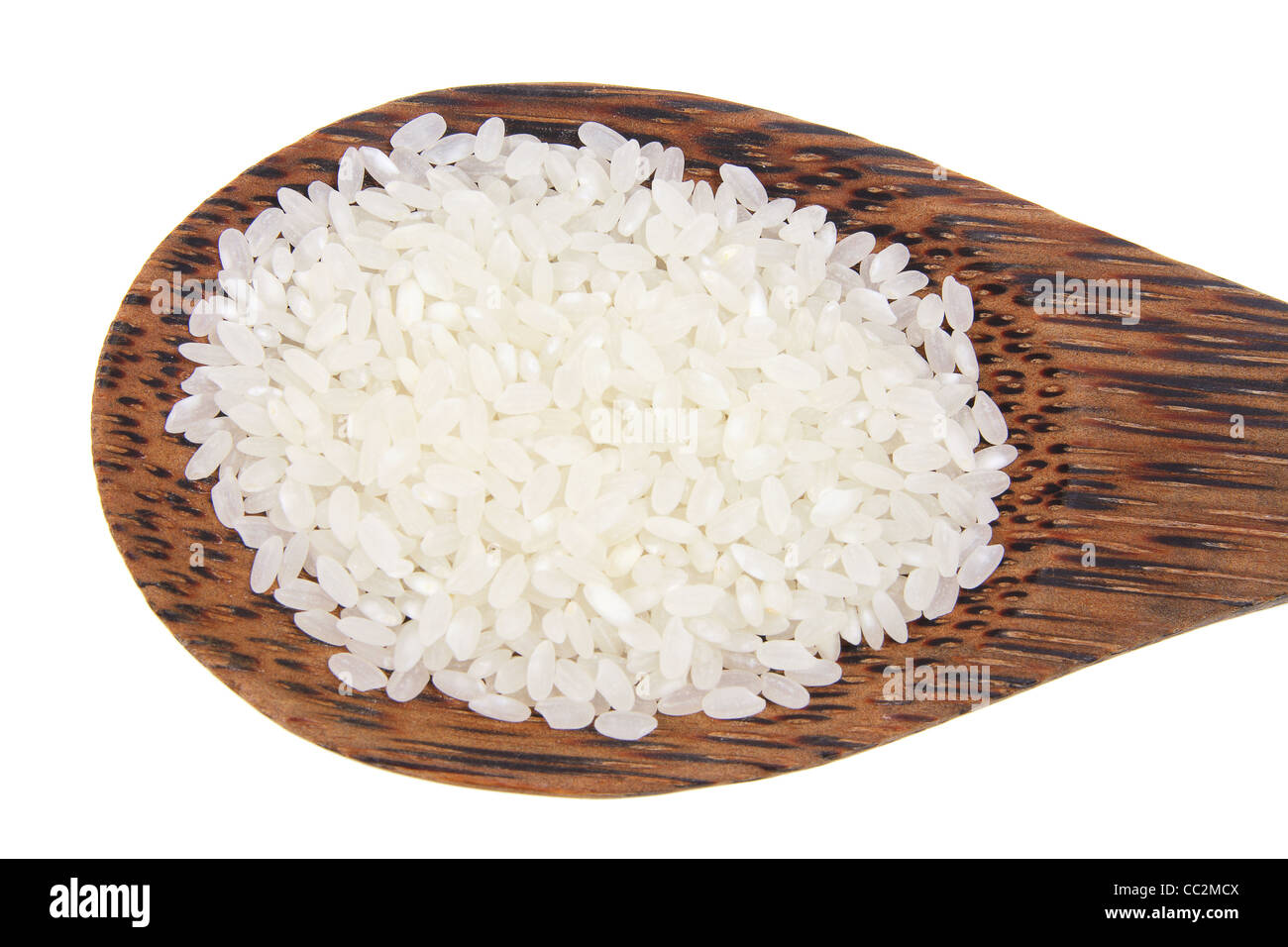 Il cucchiaio di legno con brevi chicco di riso Foto stock - Alamy