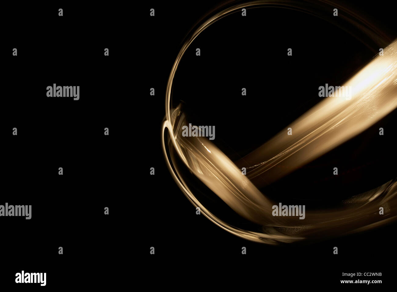 Abstract Golden volute su sfondo nero Foto Stock