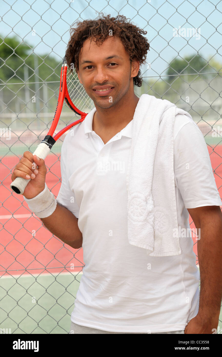 Giocatore di tennis su corte Foto Stock