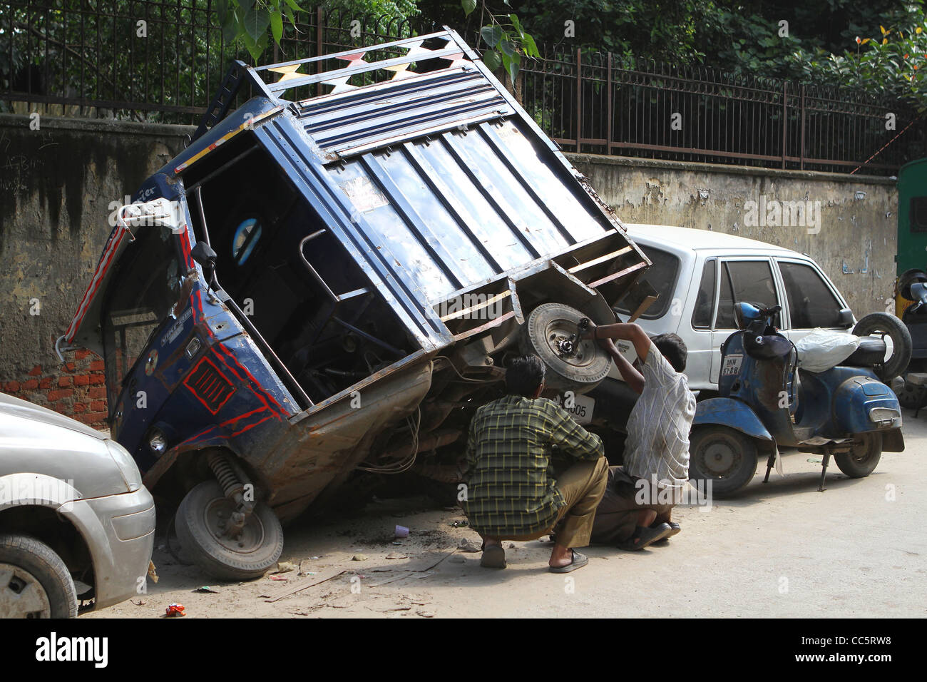 In rickshaw meccanica . Delhi. India Foto Stock