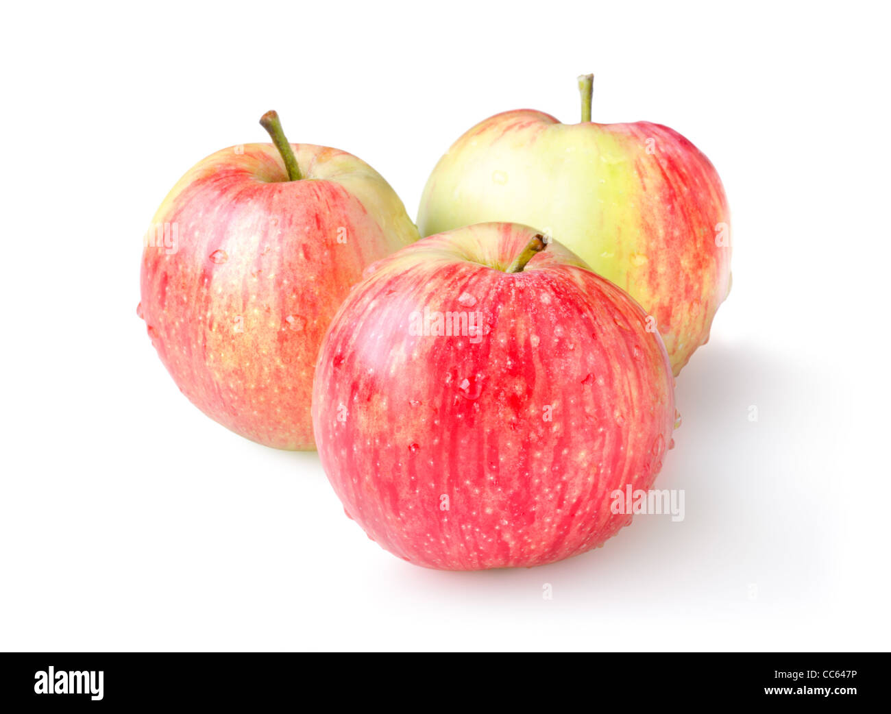 Tre mele mature isolato su uno sfondo bianco Foto Stock
