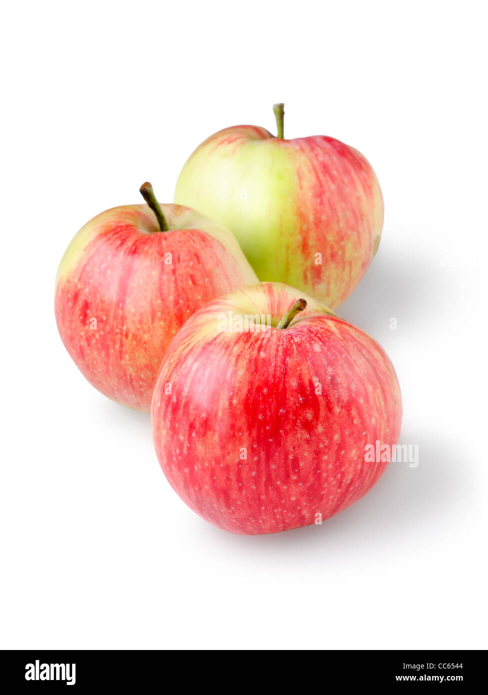 Tre mele mature isolato su uno sfondo bianco Foto Stock